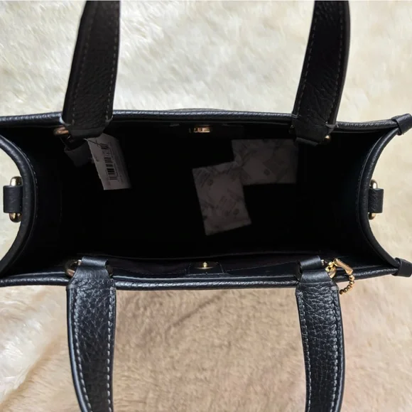 Coach Dempsey leather bag